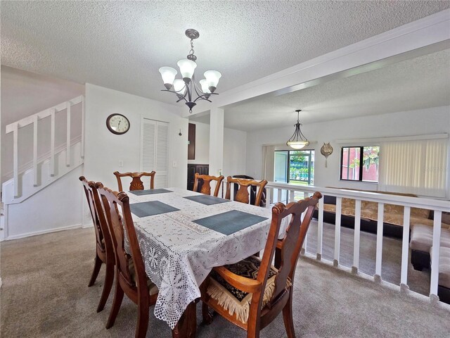 12701 N 57th St -, Unit Tampa, FL 33617 - dining room featuring carpet floors, stairway, a textured ceiling, and a chandelier