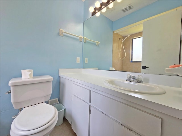 12701 N 57th St -, Unit Tampa, FL 33617 - bathroom featuring toilet, vanity, and a shower