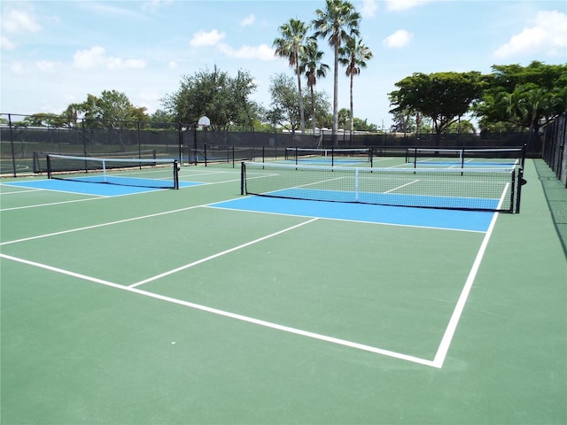 13860 Avon Park Cir Unit 104, Fort Myers, FL 33912 - view of tennis court featuring community basketball court