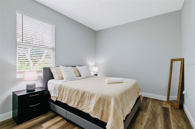 18581 Lake Worth Blvd, Port Charlotte, FL 33948 - bedroom with wood finished floors and baseboards