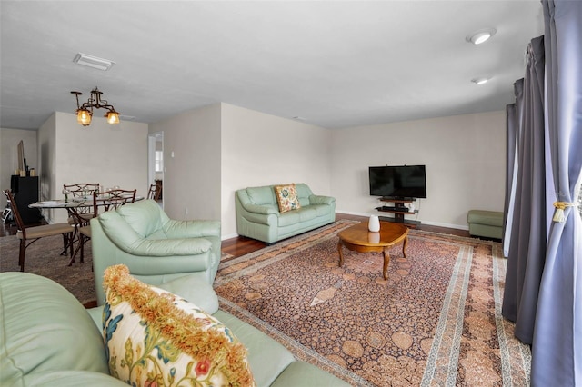 14341 Passage Way, Seminole, FL 33776 - living area with wood finished floors and baseboards