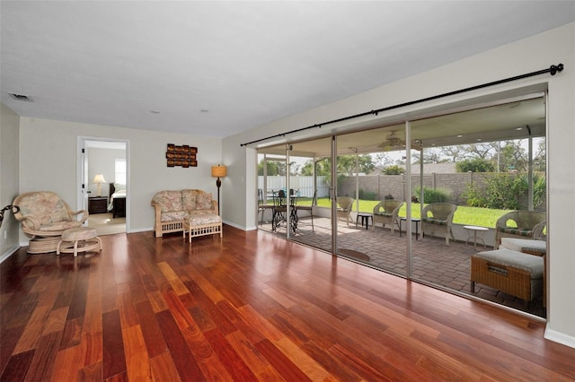 14341 Passage Way, Seminole, FL 33776 - living room with wood finished floors and baseboards