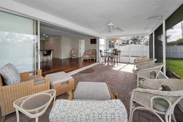 14341 Passage Way, Seminole, FL 33776 - sunroom / solarium featuring a ceiling fan