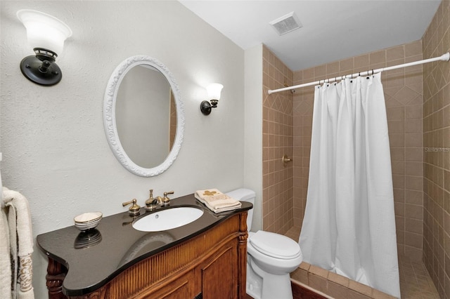 14341 Passage Way, Seminole, FL 33776 - full bathroom featuring toilet, vanity, and a shower stall