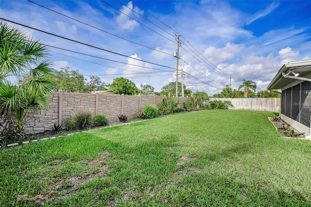 14341 Passage Way, Seminole, FL 33776 - view of yard featuring a sunroom