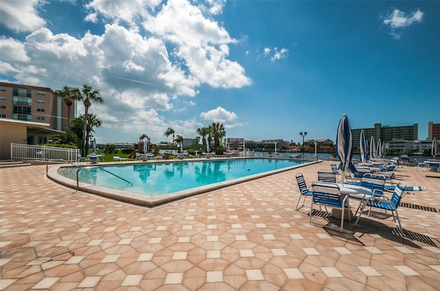 14341 Passage Way, Seminole, FL 33776 - community pool featuring a patio area