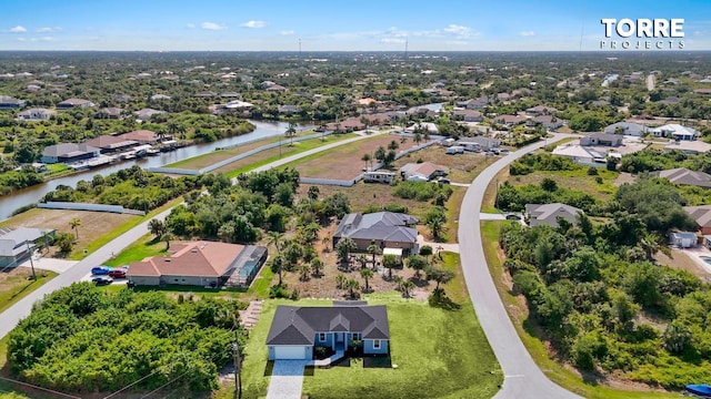 14024 Wenzel Ave, Port Charlotte, FL 33981 - aerial perspective of suburban area featuring a large body of water