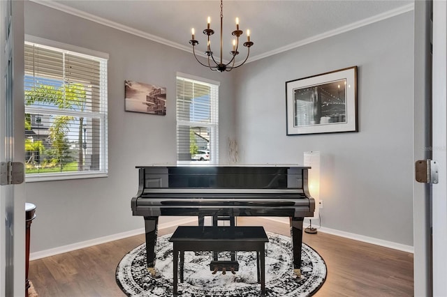 5026 Bromeliad Ave, Wimauma, FL 33598 - sitting room with wood finished floors, crown molding, baseboards, and a chandelier