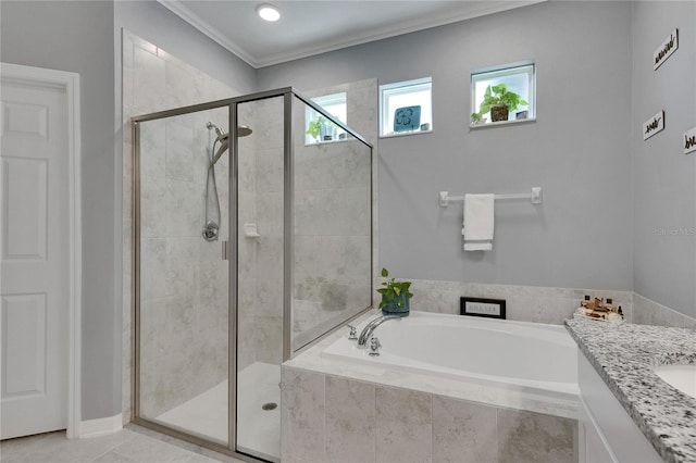 5026 Bromeliad Ave, Wimauma, FL 33598 - full bathroom featuring a garden tub, a stall shower, vanity, ornamental molding, and tile patterned flooring