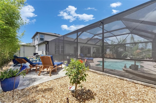 5026 Bromeliad Ave, Wimauma, FL 33598 - outdoor pool featuring a patio area and a lanai