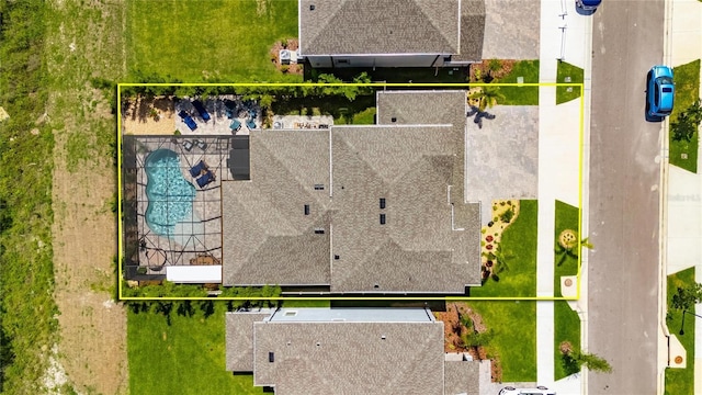 5026 Bromeliad Ave, Wimauma, FL 33598 - aerial overview of property's location with property parcel outlined and a pool