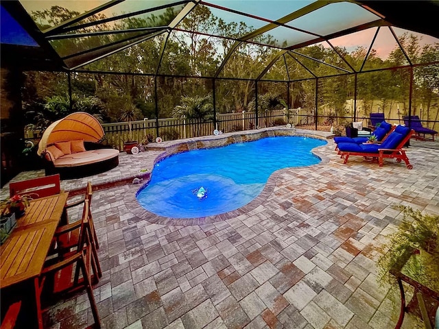 5026 Bromeliad Ave, Wimauma, FL 33598 - view of pool featuring a patio area, a fenced backyard, and glass enclosure