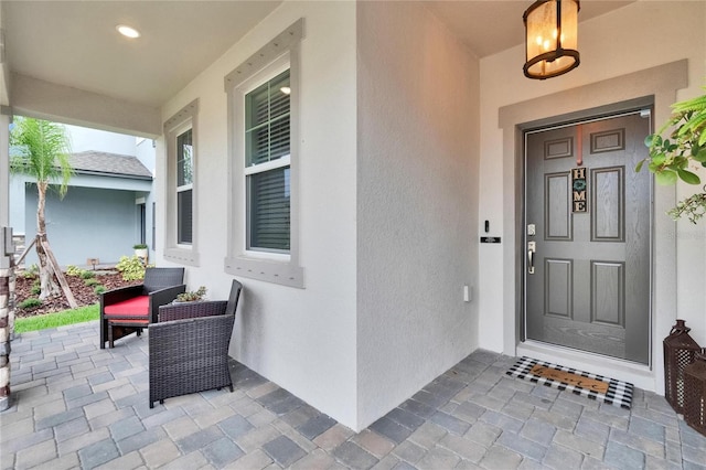 5026 Bromeliad Ave, Wimauma, FL 33598 - property entrance with stucco siding
