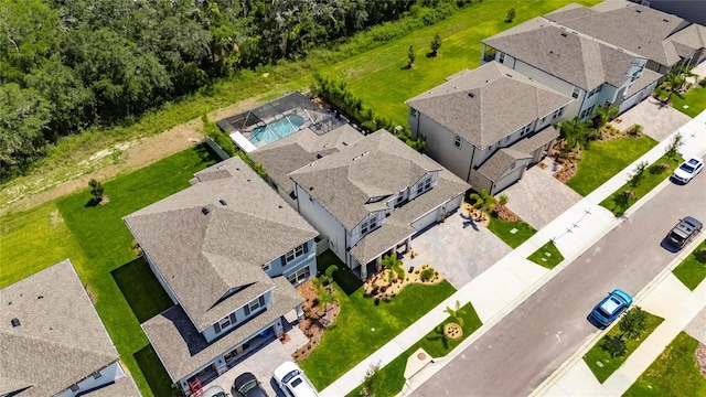 5026 Bromeliad Ave, Wimauma, FL 33598 - aerial perspective of suburban area
