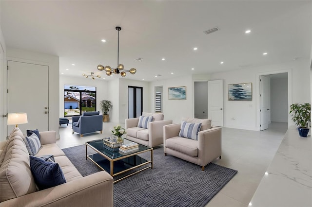 3578 NE 9th Pl, Cape Coral, FL 33909 - living room featuring recessed lighting and a chandelier