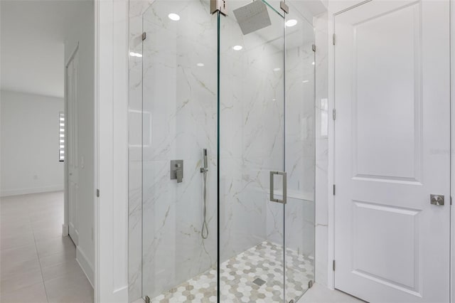 3578 NE 9th Pl, Cape Coral, FL 33909 - bathroom featuring a marble finish shower and tile patterned floors