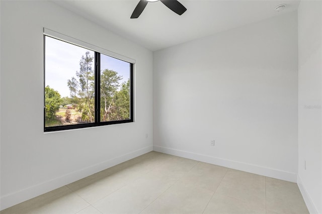 3578 NE 9th Pl, Cape Coral, FL 33909 - spare room featuring baseboards, ceiling fan, and light tile patterned flooring