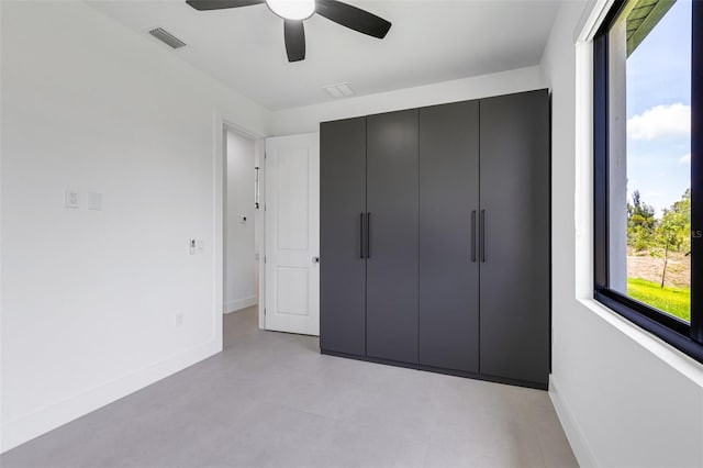 3578 NE 9th Pl, Cape Coral, FL 33909 - unfurnished bedroom featuring baseboards and a ceiling fan