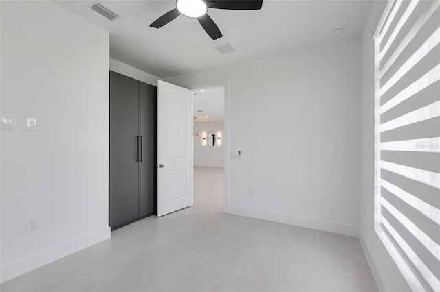 3578 NE 9th Pl, Cape Coral, FL 33909 - empty room with a ceiling fan and baseboards