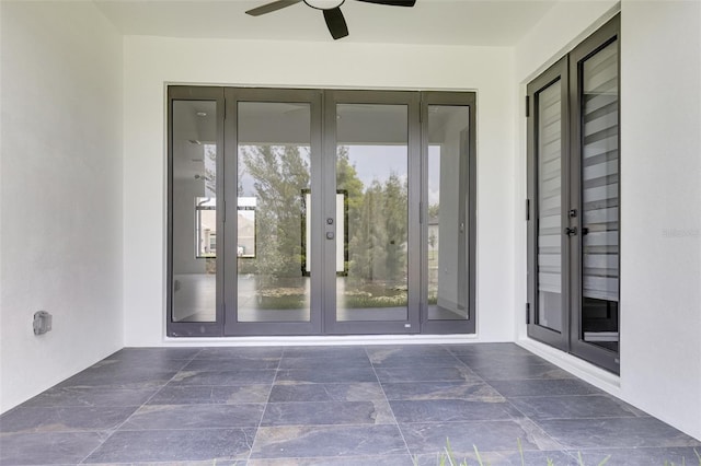 3578 NE 9th Pl, Cape Coral, FL 33909 - entrance to property with french doors, ceiling fan, and stucco siding