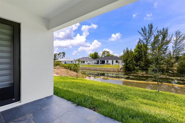 3578 NE 9th Pl, Cape Coral, FL 33909 - view of patio / terrace with a water view and a residential view