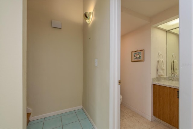 1500 Sunset Rd Unit C10, Tarpon Springs, FL 34689 - hall with light tile patterned floors and baseboards
