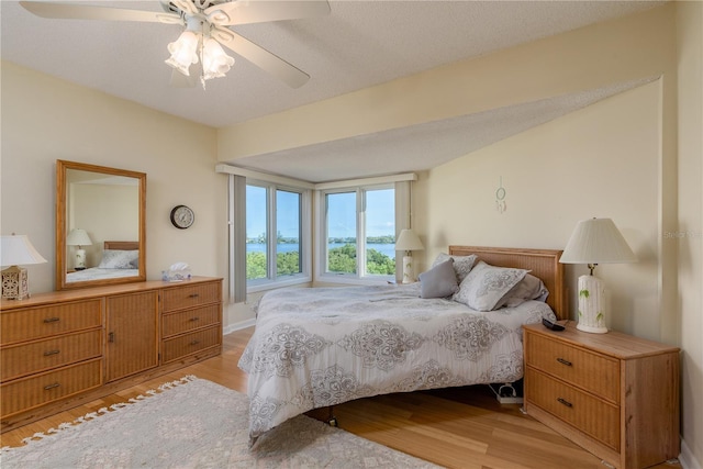 1500 Sunset Rd Unit C10, Tarpon Springs, FL 34689 - bedroom with light wood-style flooring and ceiling fan