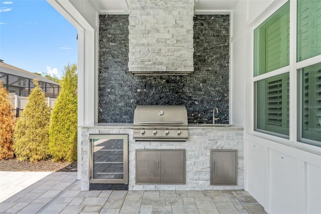 13859 Sharp Hawk Dr, Riverview, FL 33569 - view of patio with wine cooler and a sink