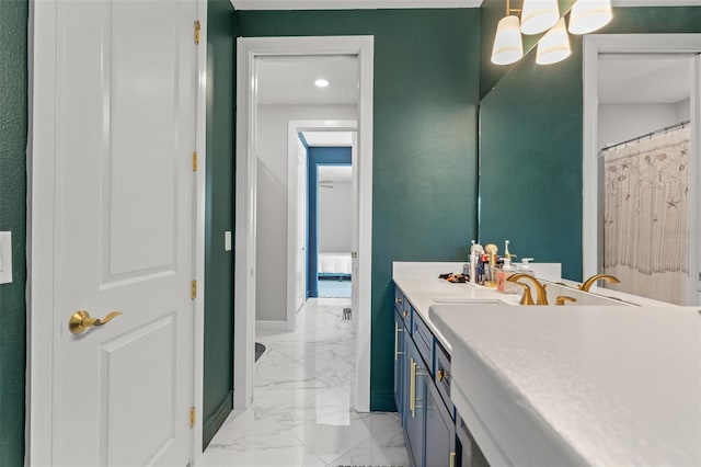 13859 Sharp Hawk Dr, Riverview, FL 33569 - full bathroom featuring marble finish floors, vanity, a chandelier, and baseboards