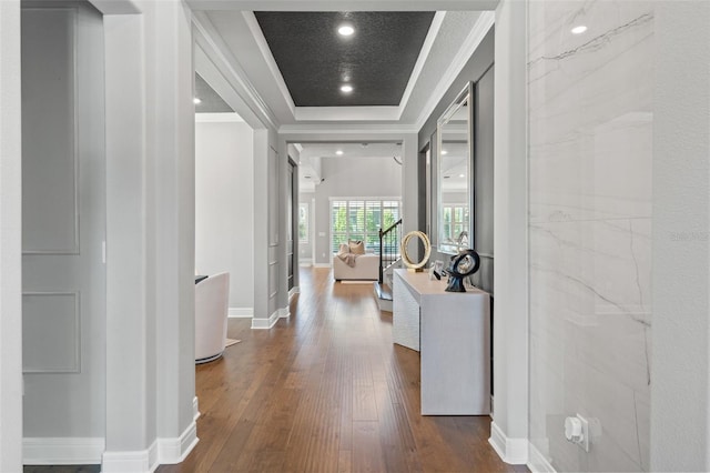 13859 Sharp Hawk Dr, Riverview, FL 33569 - hallway with ornamental molding, dark wood-style flooring, and baseboards