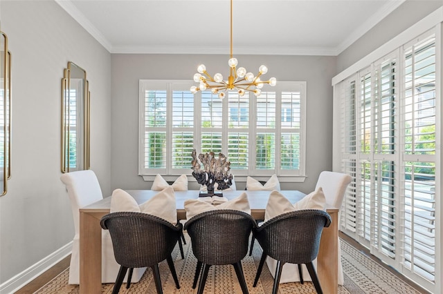 13859 Sharp Hawk Dr, Riverview, FL 33569 - dining area with a chandelier, plenty of natural light, crown molding, wood finished floors, and baseboards