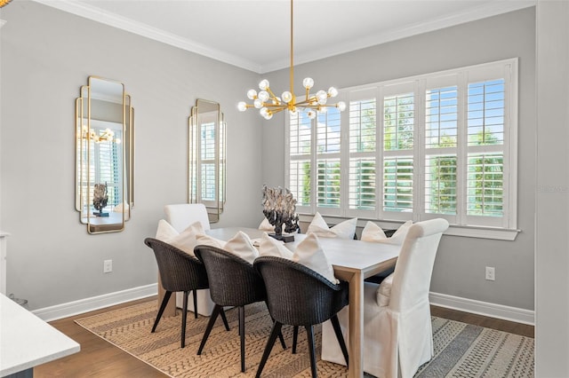 13859 Sharp Hawk Dr, Riverview, FL 33569 - dining area with a chandelier, dark wood-style flooring, crown molding, and baseboards