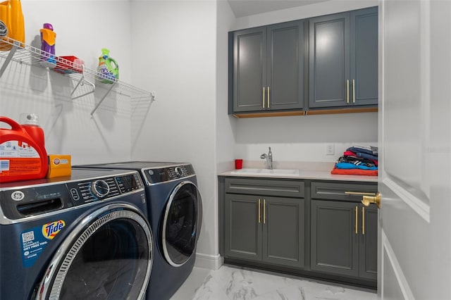 13859 Sharp Hawk Dr, Riverview, FL 33569 - washroom with cabinet space, washer and dryer, light marble finish flooring, and baseboards