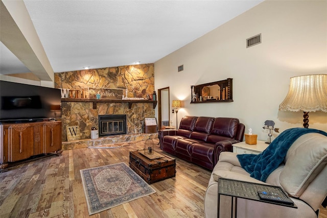 11109 Winn Rd, Riverview, FL 33569 - living area with hardwood / wood-style floors and a fireplace