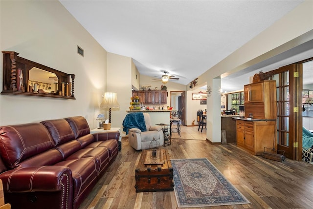 11109 Winn Rd, Riverview, FL 33569 - living area with lofted ceiling, hardwood / wood-style flooring, and a ceiling fan