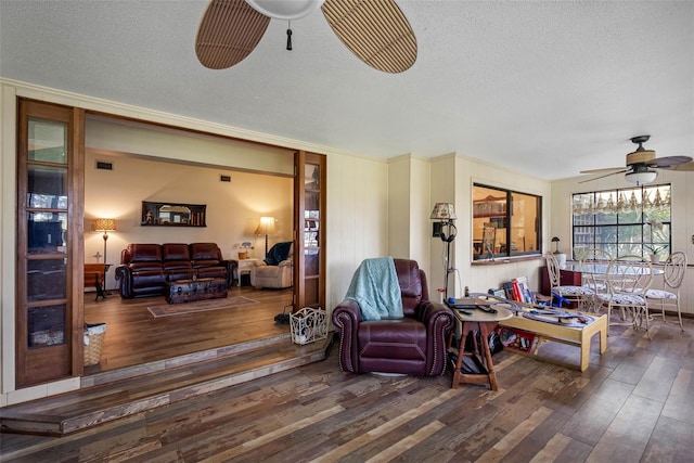 11109 Winn Rd, Riverview, FL 33569 - living area featuring a ceiling fan, wood finished floors, and a textured ceiling