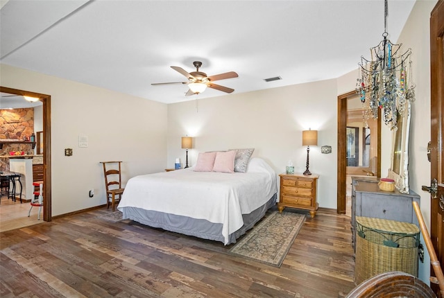 11109 Winn Rd, Riverview, FL 33569 - bedroom featuring dark wood-style flooring, baseboards, and a ceiling fan