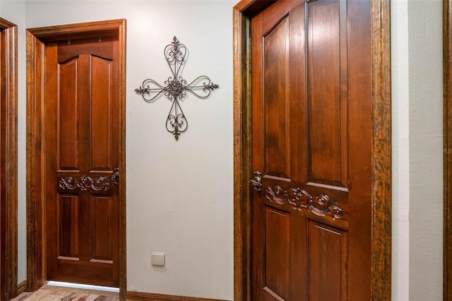 11109 Winn Rd, Riverview, FL 33569 - entryway featuring baseboards and light wood finished floors