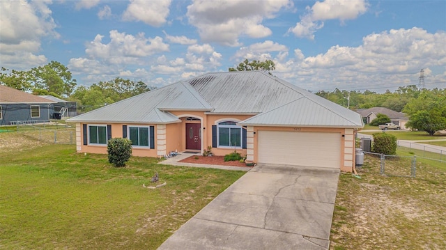 5432 Queen Ave, Spring Hill, FL 34609 - ranch-style house featuring stucco siding, an attached garage, metal roof, and concrete driveway