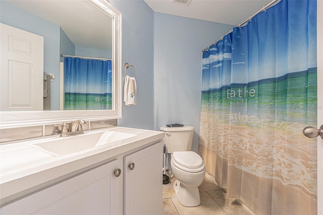 5432 Queen Ave, Spring Hill, FL 34609 - full bath with vanity, toilet, and tile patterned flooring