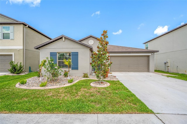 31775 Sun Kettle Loop, Wesley Chapel, FL 33545 - view of front of home featuring a garage, driveway, stucco siding, and a front yard