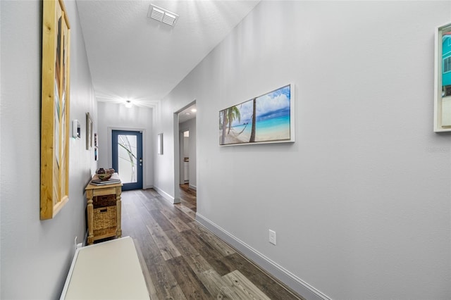 31775 Sun Kettle Loop, Wesley Chapel, FL 33545 - hallway featuring dark wood finished floors and baseboards