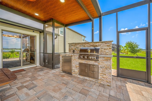 31775 Sun Kettle Loop, Wesley Chapel, FL 33545 - unfurnished sunroom with an outdoor kitchen