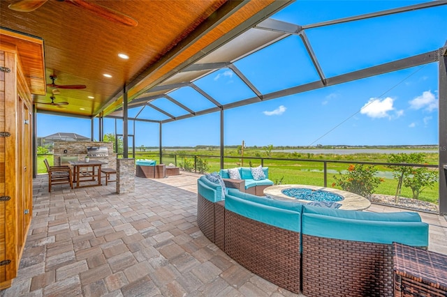31775 Sun Kettle Loop, Wesley Chapel, FL 33545 - view of patio with ceiling fan, outdoor lounge area, glass enclosure, and a view of rural / pastoral area