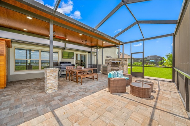 31775 Sun Kettle Loop, Wesley Chapel, FL 33545 - view of patio / terrace featuring glass enclosure and ceiling fan