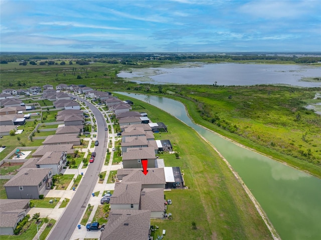 31775 Sun Kettle Loop, Wesley Chapel, FL 33545 - aerial view of residential area with a nearby body of water