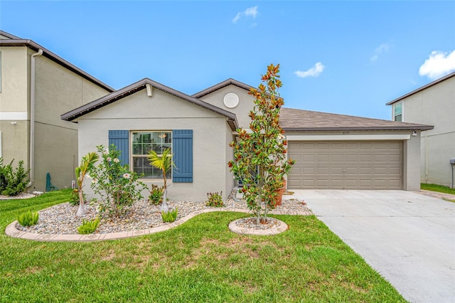 31775 Sun Kettle Loop, Wesley Chapel, FL 33545 - view of front facade with a garage, concrete driveway, a front yard, and stucco siding