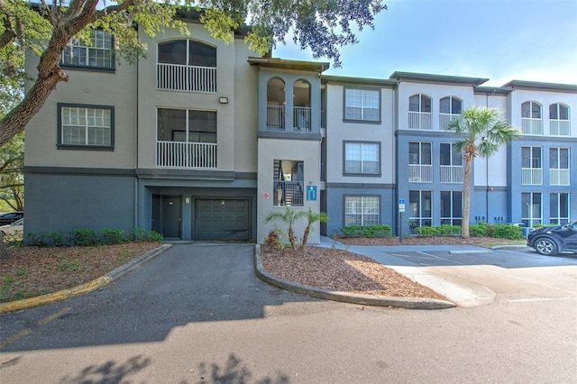 13025 Sanctuary Cove Dr Unit 301, Temple Terrace, FL 33637 - view of front of house with stucco siding