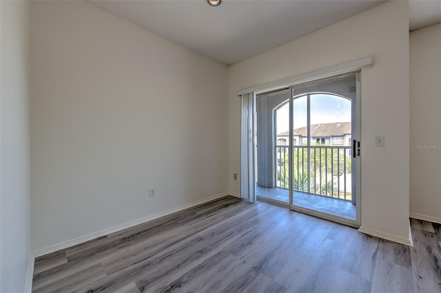 13025 Sanctuary Cove Dr Unit 301, Temple Terrace, FL 33637 - unfurnished room with wood finished floors and baseboards