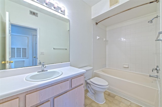 13025 Sanctuary Cove Dr Unit 301, Temple Terrace, FL 33637 - bathroom featuring toilet, shower / washtub combination, and vanity